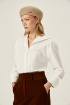 KADİFE Pantolon - Kahverengi | Yüksek bel, bootcut kesim kadife pantolon. Uzun boy, ayarlanabilir paça. Serin havalar için sıcaklık ve şıklık sunar. Zamansız parça.