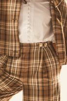 Tartan Pantolon - Ekose | Tartan ekose desenli pantolon, yüksek bel ve geniş kesimiyle rahatlık sunar. Polyester, viskon ve elastan karışımıyla formunu korur.